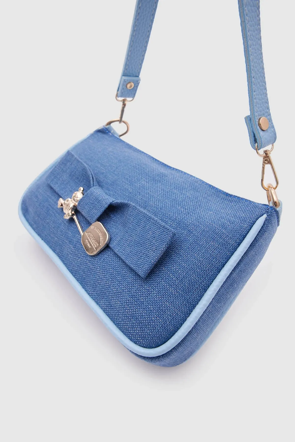 Kate Denim Buckled Denim Baguette Bag