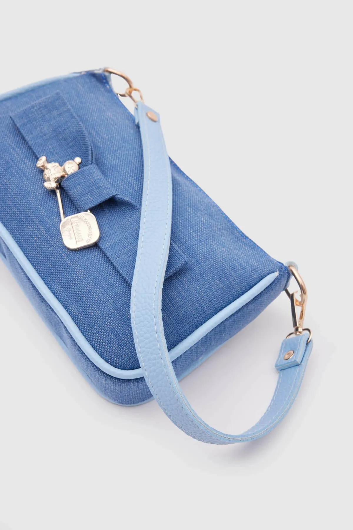 Kate Denim Buckled Denim Baguette Bag
