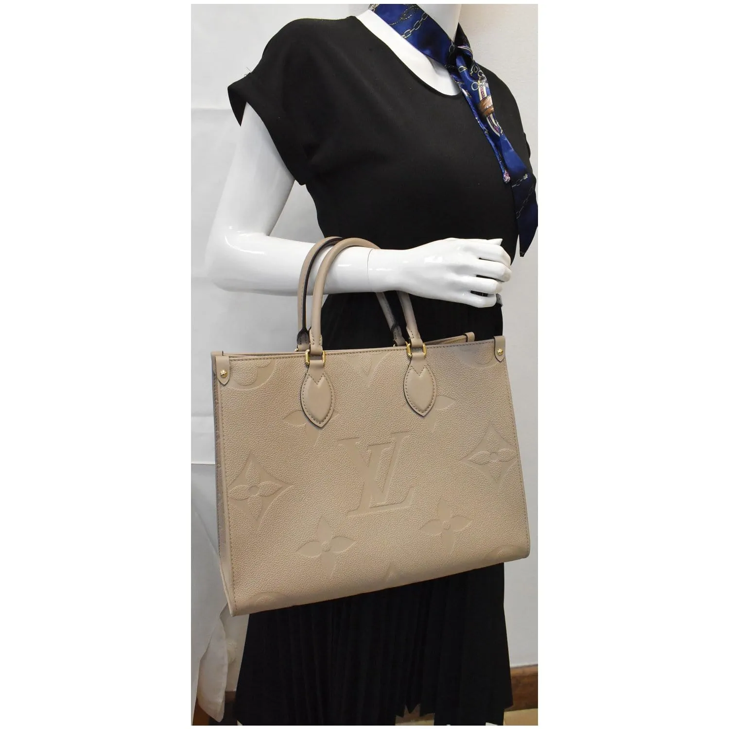 LOUIS VUITTON Onthego MM Monogram Empreinte Shoulder Bag Tourterelle