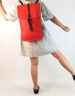 Rains large red rucksack / backpack with black straps and detail