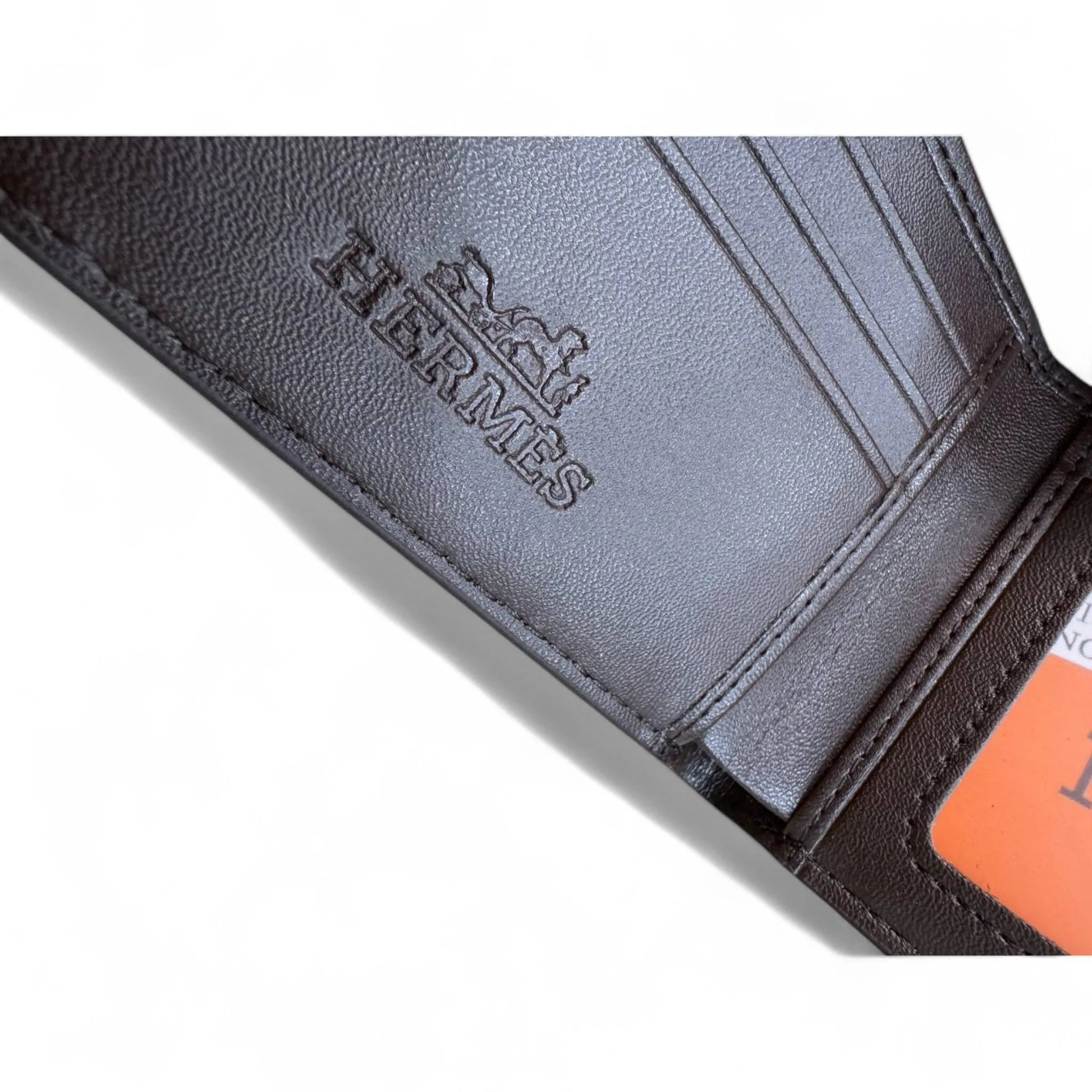 Sophisticated Brown Hermès Wallet with Ostrich Leather Texture